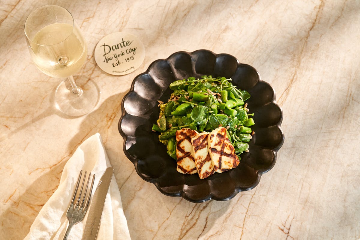 a banana sitting on top of a wooden table