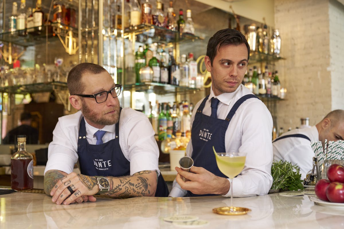 a man sitting at a table in a restaurant