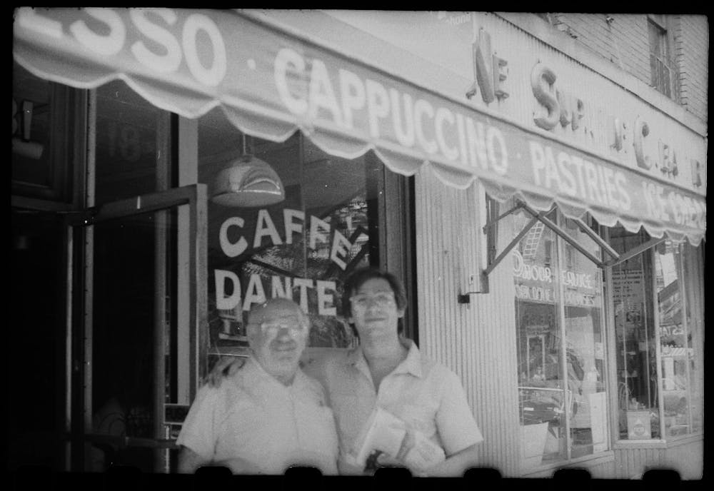 a person standing in front of a store