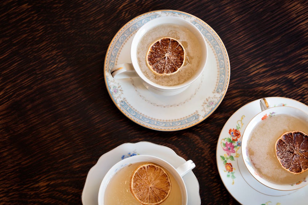 a plate of food and a cup of coffee
